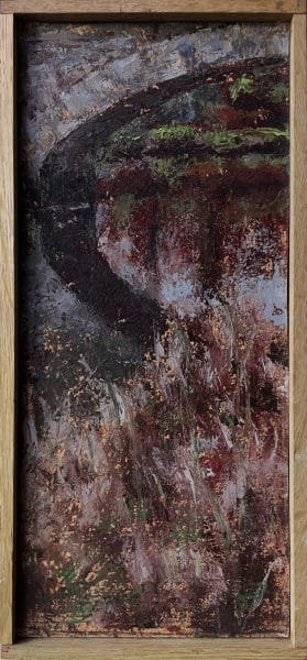 A landscape oil painting of a stone bridge over a river with autumn-colored grasses in the foreground displayed on a wall.