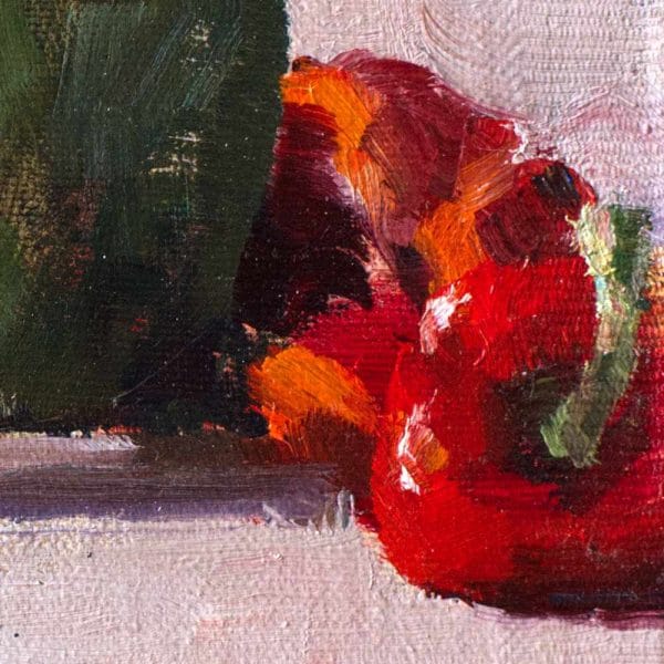 Detail of a oil painting of red peppers, a green copper vase juxtaposed with an orange fabric all arranged on a grey background.