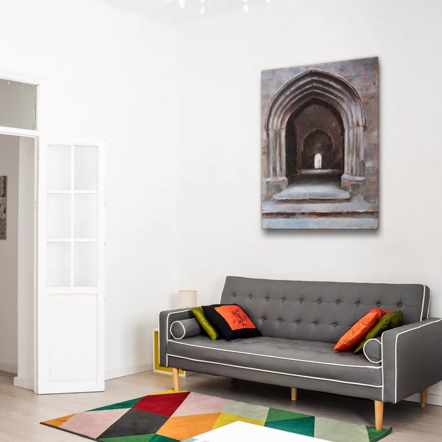 Oil painting of a open archway looking into the interior and distance archway at the Rock of Cashel, Ireland displayed on a wall.
