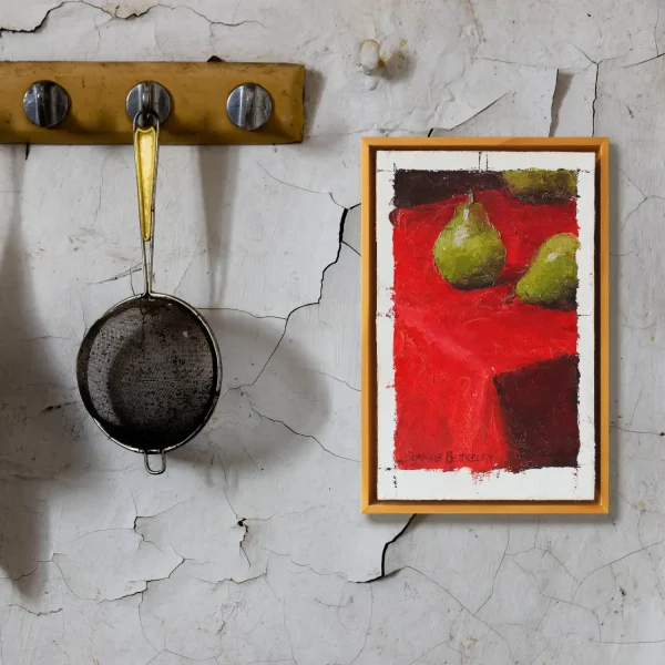 Oil painting of three green pears arranged on a bright red table cloth on a wall setting.