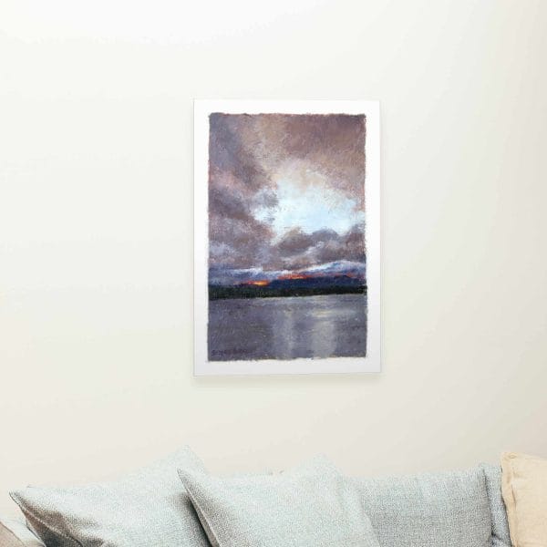Giclée of an oil painting of last yellow, orange and red light rays of the sun peaking through a storm cloud-filled sky above distant mesas overlooking Lake Abiquiu, New Mexico.