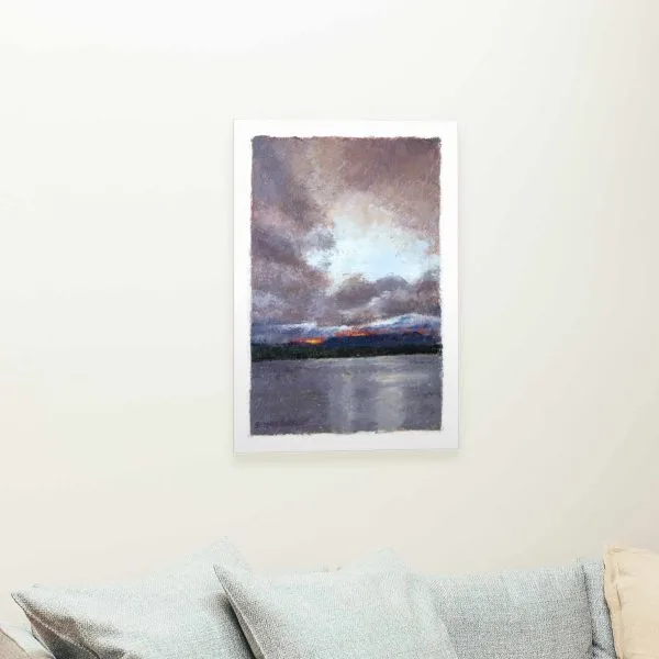 Giclée of an oil painting of last yellow, orange and red light rays of the sun peaking through a storm cloud-filled sky above distant mesas overlooking Lake Abiquiu, New Mexico.