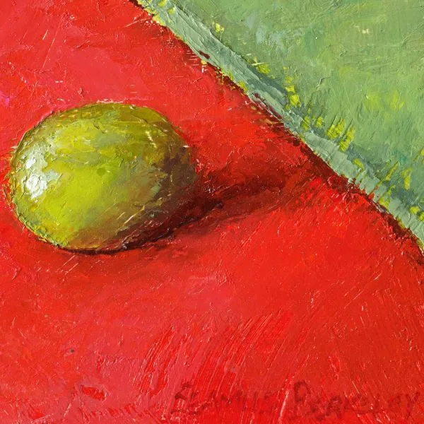Detail of an oil painting of a green grape on red fabric juxtaposed with a red grape on a green fabric.
