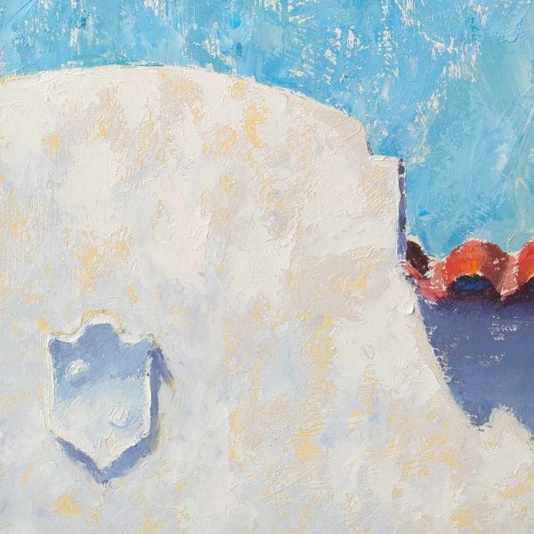 Detail of an oil painting of a Spanish colonial style white building with red tile roof juxtaposed below a bright blue sky.