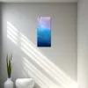 An oil painting of the water and how it created abstract shapes of the reflected surroundings in the Berkeley Marina in Berkeley, California as displayed on an interior wall.