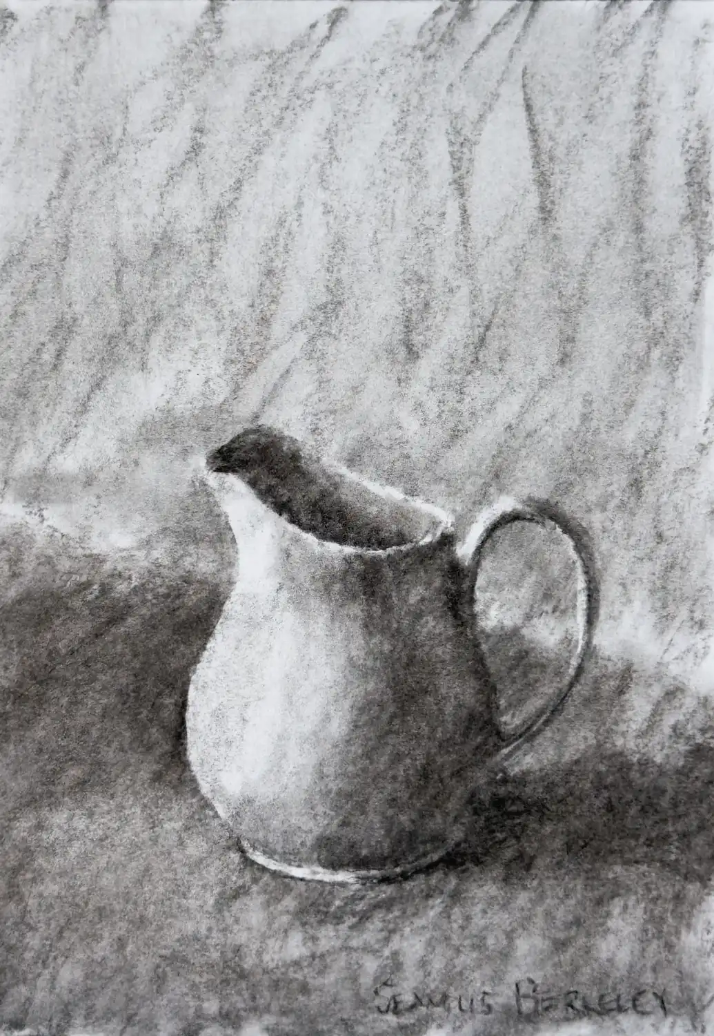 A charcoal drawing of a white pitcher with a handle on the right placed on a grey fabric.